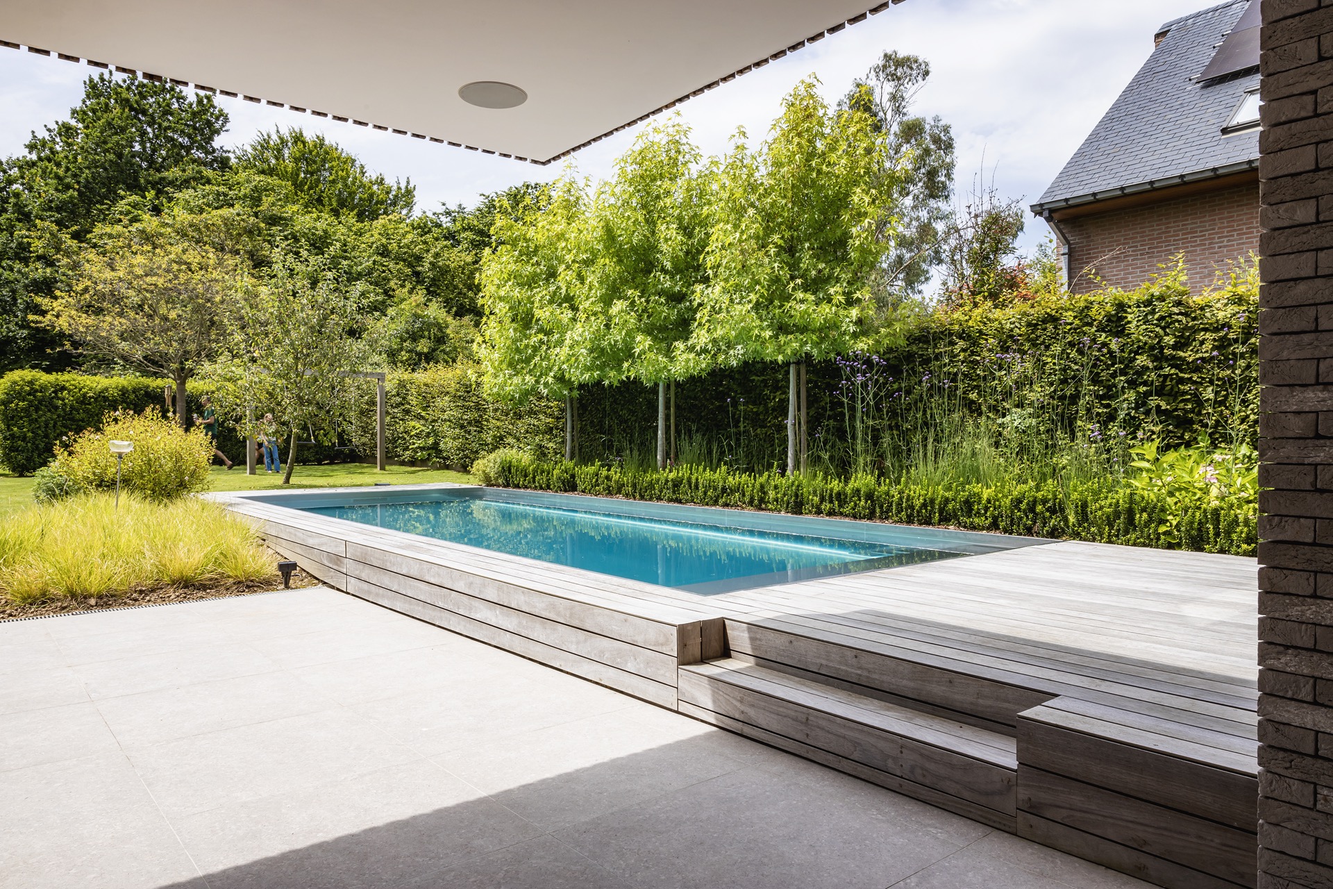 piscina in acciaio inox 10x4 m: dettaglio della parete in acciaio inox con scritta e linea d’acqua dritta, Luxury, Design, Exclusive, Modern, Custom Made, Special, Beautiful