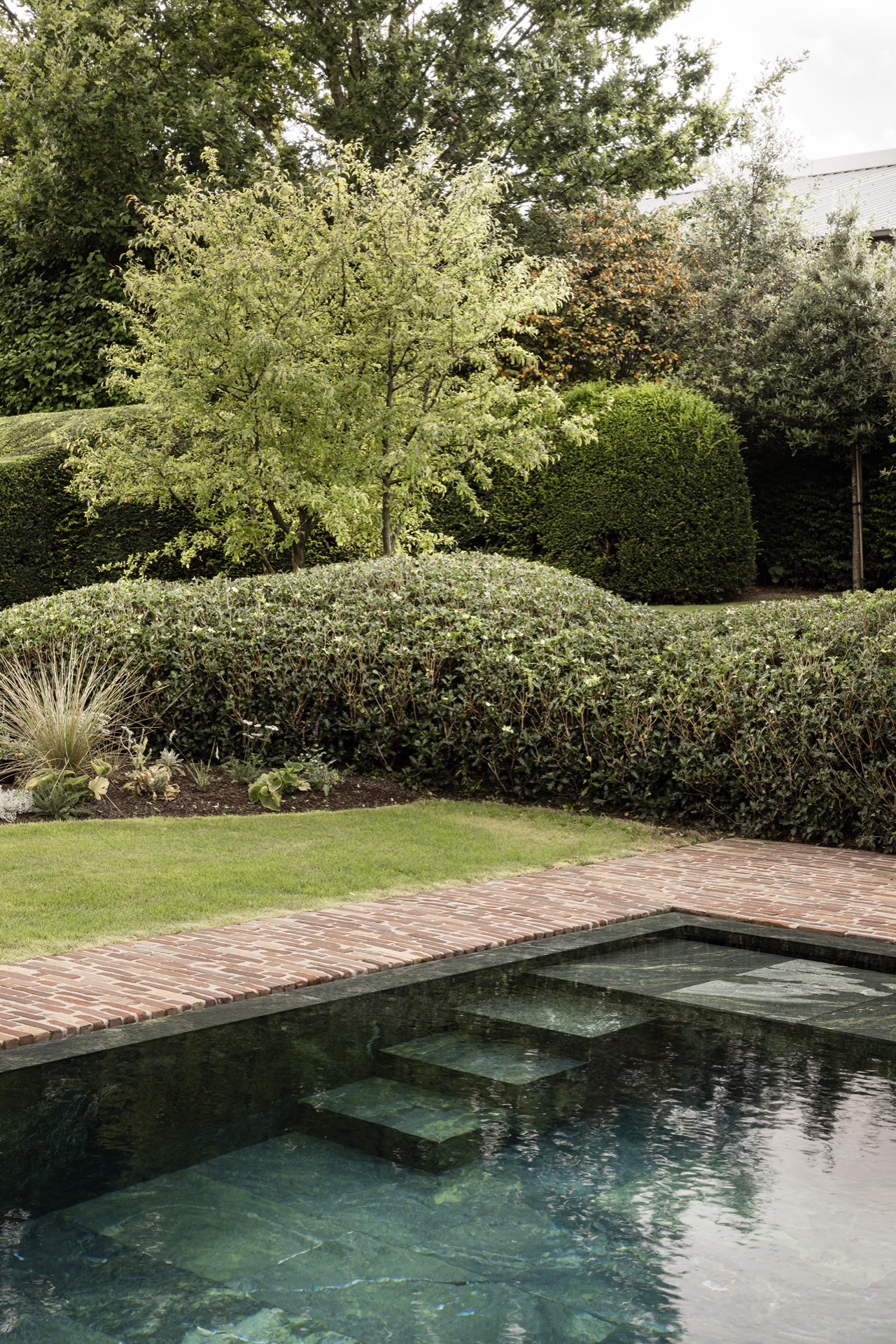 landscape garden sightline: pool with a view to a greenhouse-like canopy in dark wood and landscaped garden, Luxury, Design, Exclusive, Modern, Custom Made, Special, Beautiful