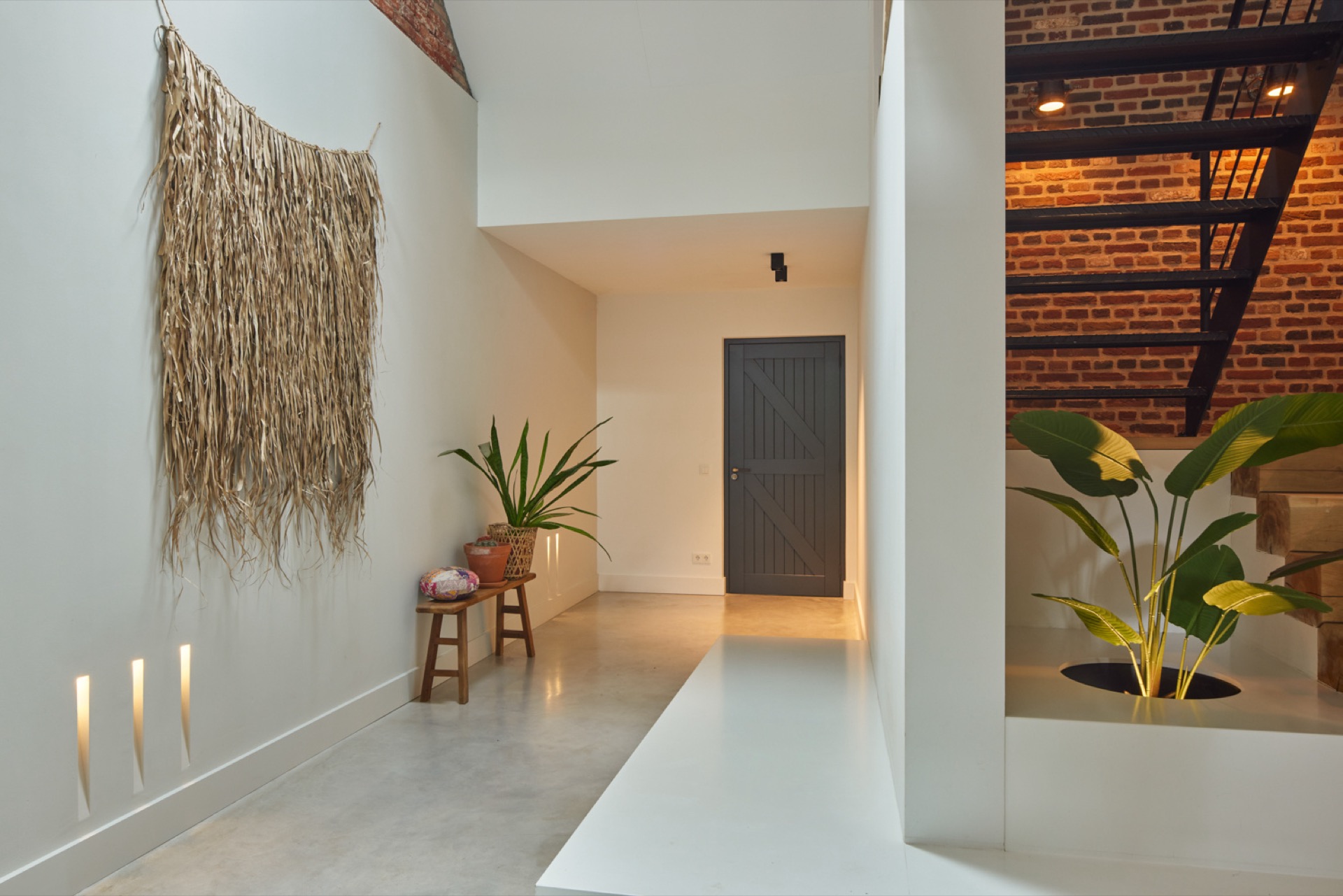 mediterranean-inspired interior with natural light and exposed wooden beams: entry hallway with dark door and a view toward, Luxe, Design, Exclusief, Modern, Maatwerk, Bijzondere, Mooie