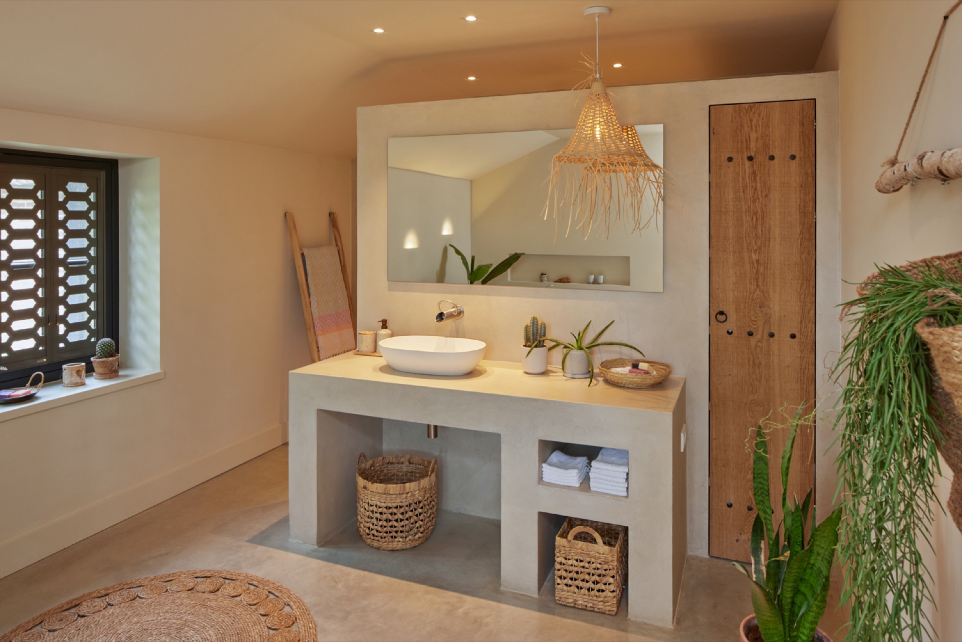 mediterranean-inspired interior with natural light and exposed wooden beams: wooden storage wall with perforated panels and, Luxe, Design, Exclusief, Modern, Maatwerk, Bijzondere, Mooie