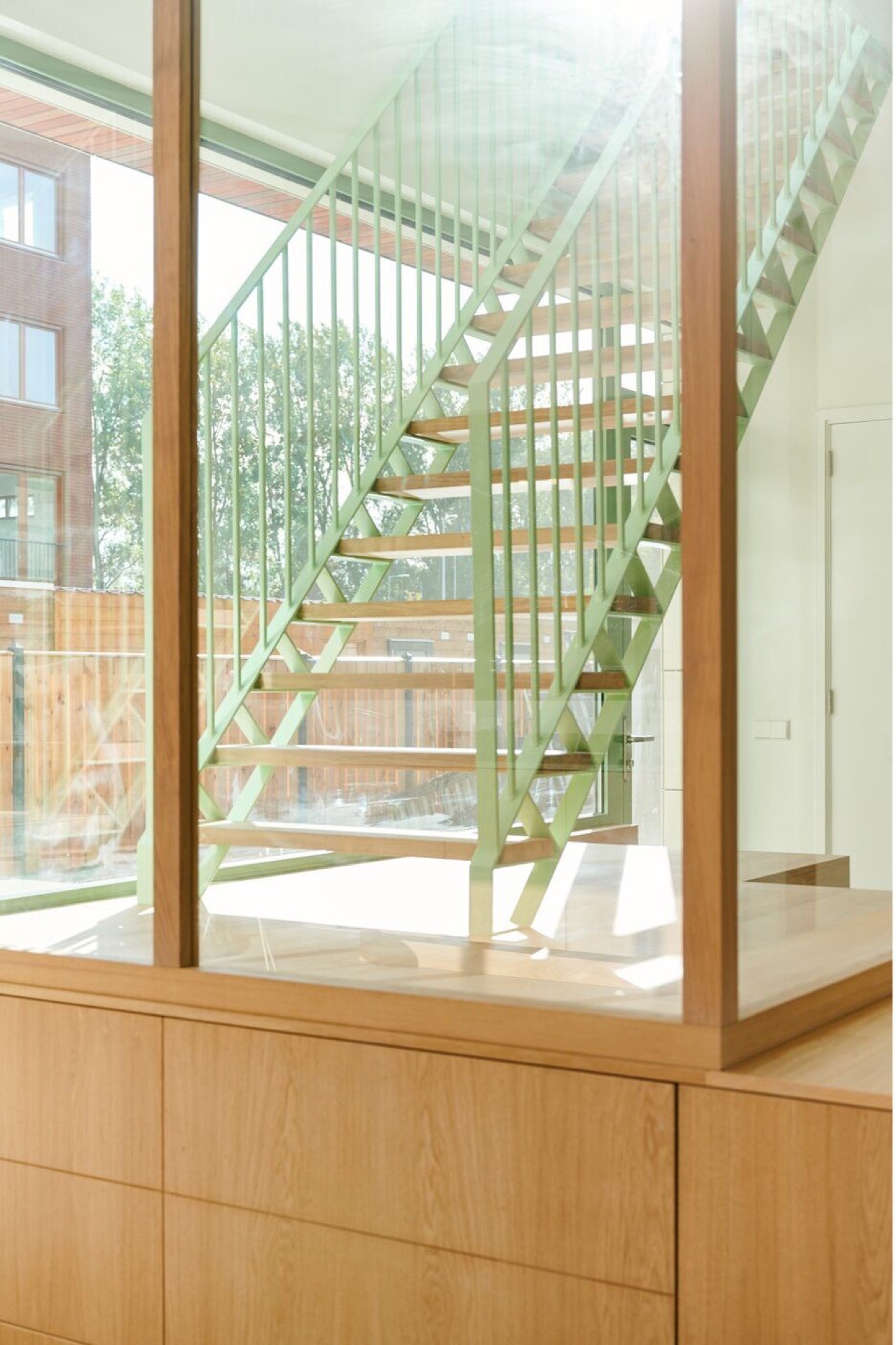 modern detached villa with glass stairwell: glass stairwell with green handrail and view of the wooden stairs, Luxury, Design, Exclusive, Modern, Custom Made, Special, Beautiful