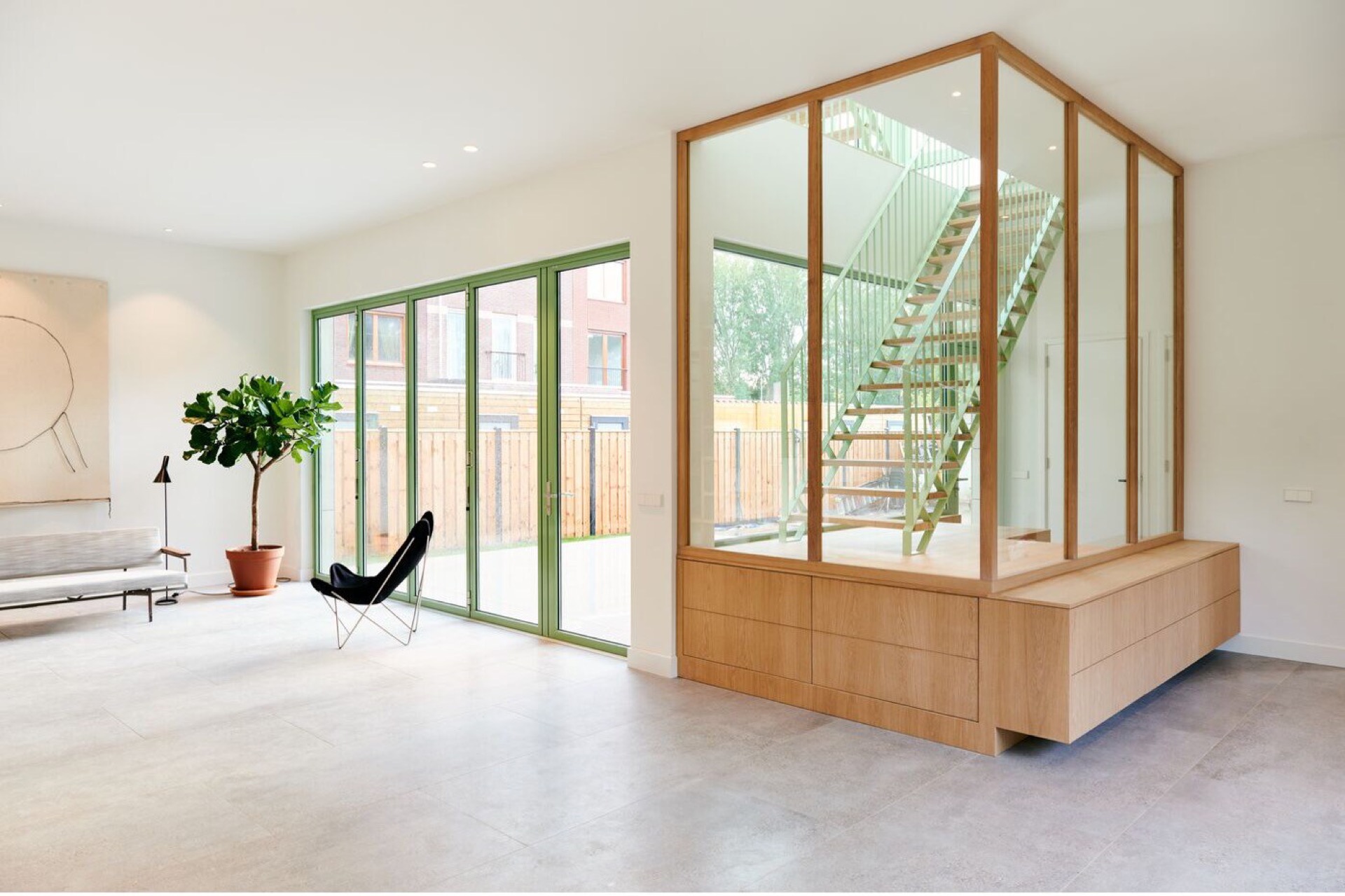 modern detached villa with glass stairwell: view of a glass stairwell from the living area with green window frames, Luxury, Design, Exclusive, Modern, Custom Made, Special, Beautiful