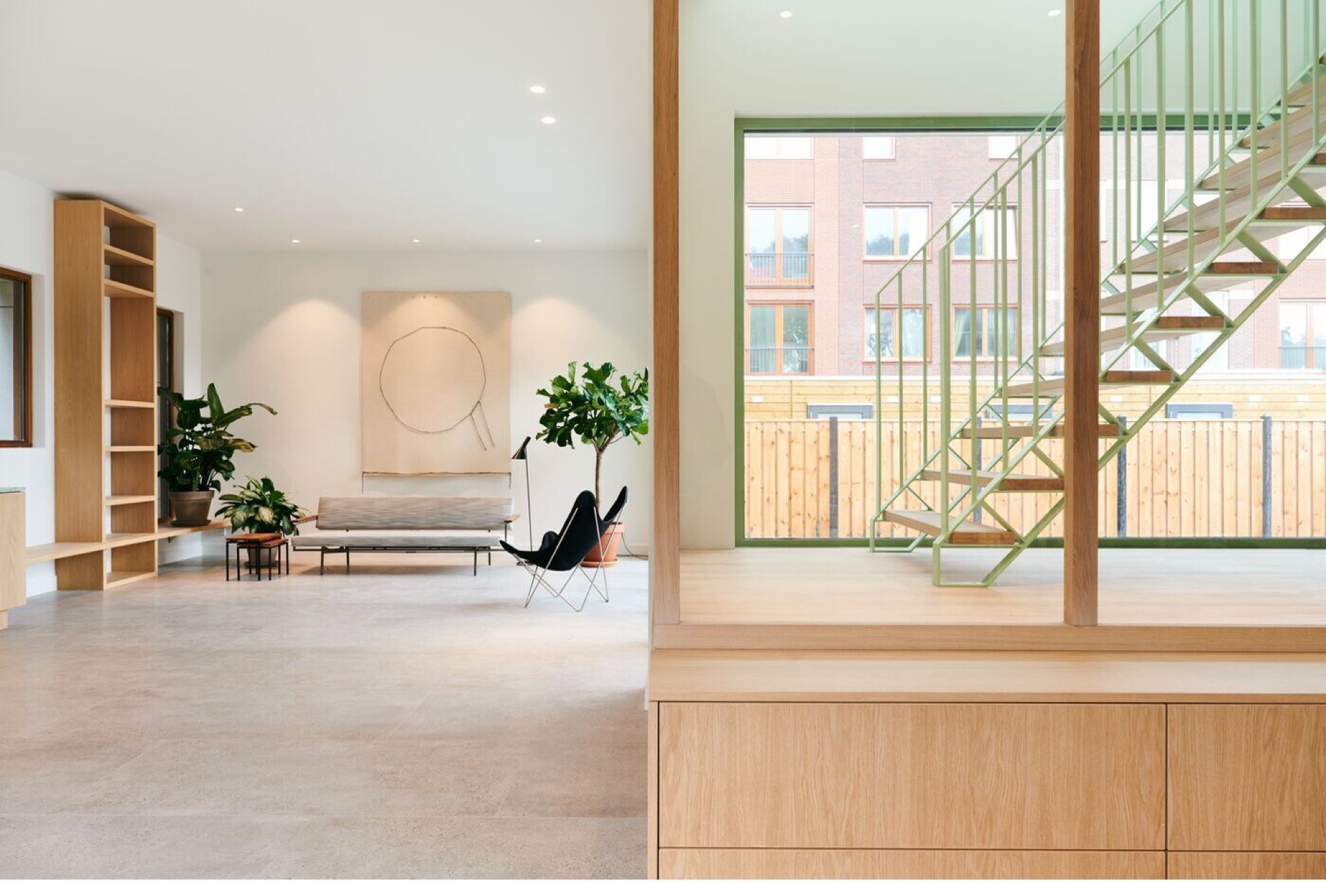 modern detached villa with glass stairwell: living area with wood built-in wall and a view toward the glass stairwell, Luxury, Design, Exclusive, Modern, Custom Made, Special, Beautiful