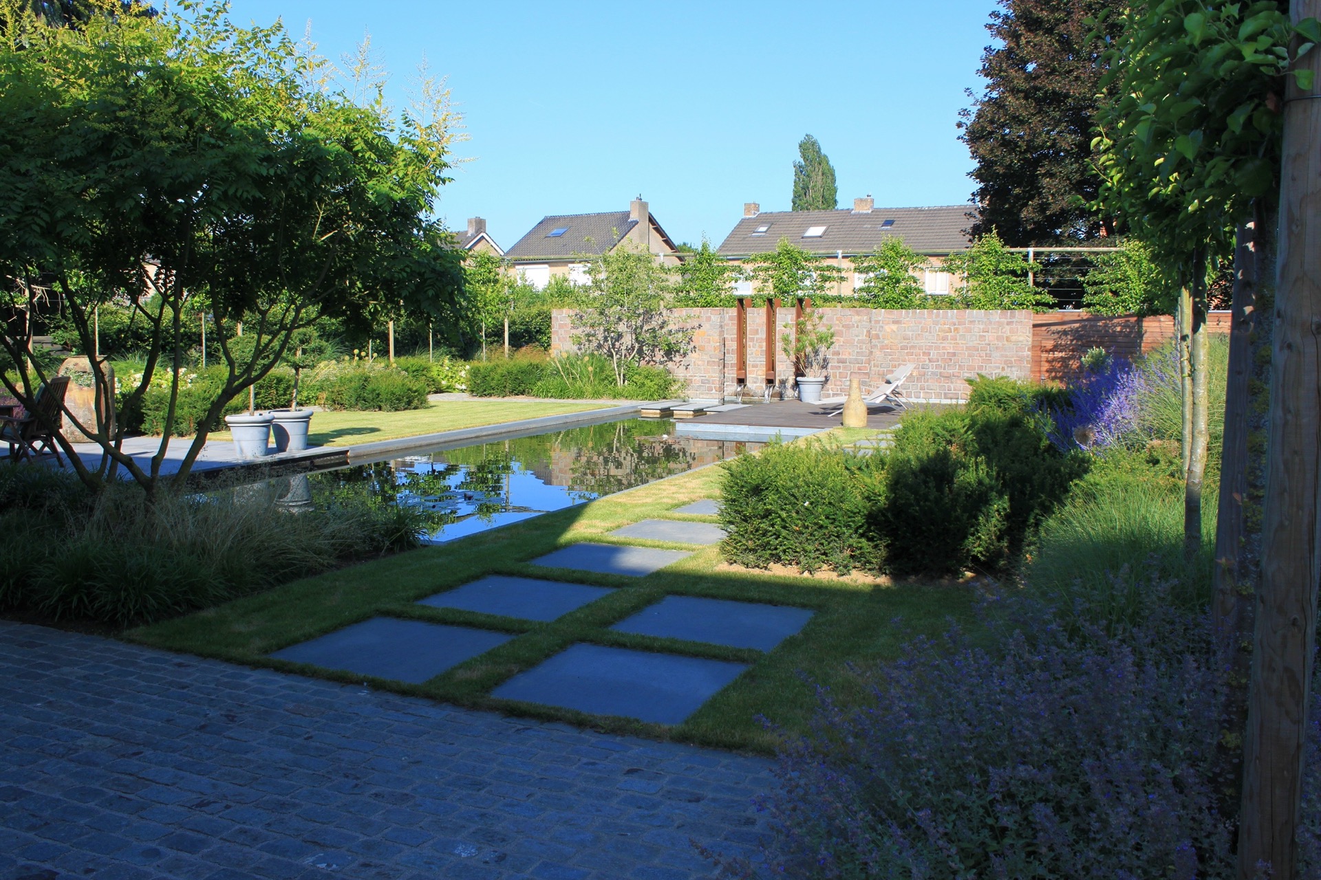 estanque de natación jardín: swimming pond backyard: view of a swimming pond with stone edge, stepping stones and a wooden, Luxury, Design, Exclusive, Modern, Custom Made, Special, Beautiful