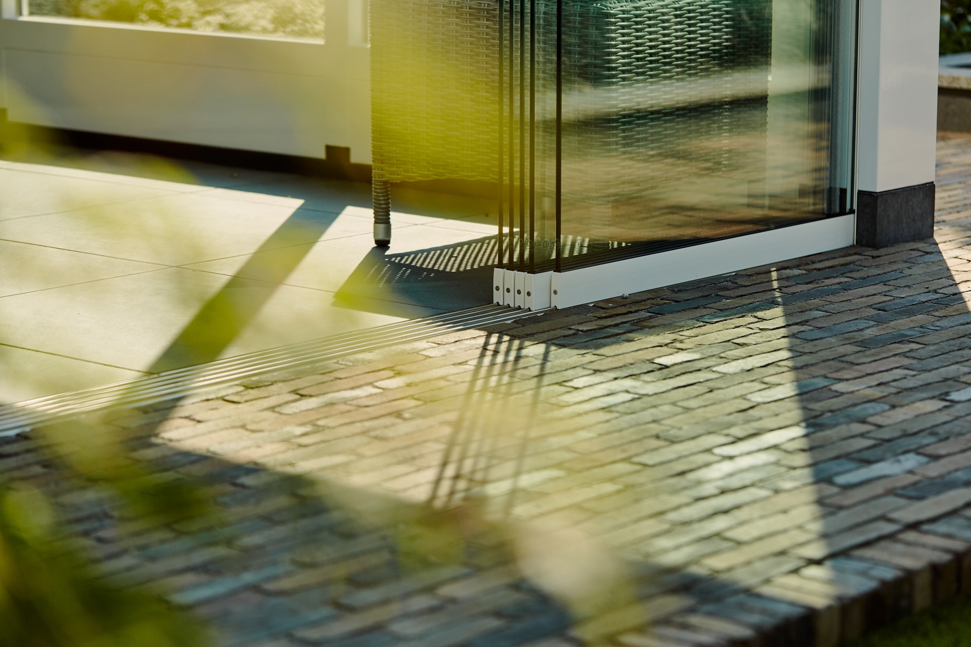 outdoor room sliding glass: close-up of the base profile connection along the terrace edge of the outdoor room, Luxury, Design, Exclusive, Modern, Custom Made, Special, Beautiful