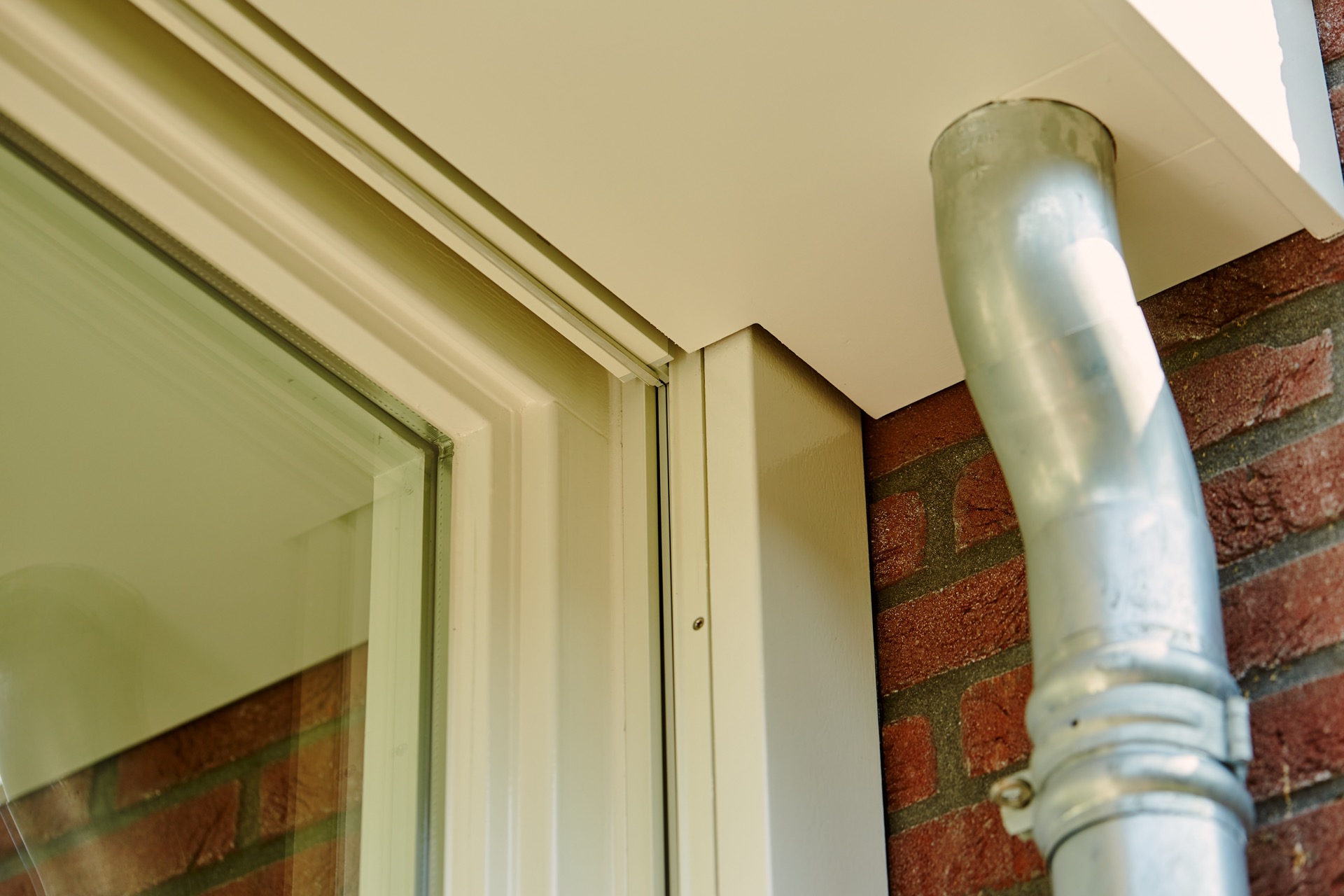 outdoor room sliding glass: detail of profile and vertical frame next to brick wall in the outdoor room, Luxury, Design, Exclusive, Modern, Custom Made, Special, Beautiful