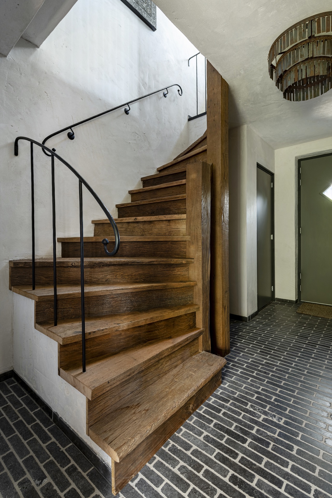 rustic country kitchen: rustic wooden staircase with black handrail and slate-look floor tiles with light grout, Luxury, Design, Exclusive, Modern, Custom Made, Special, Beautiful