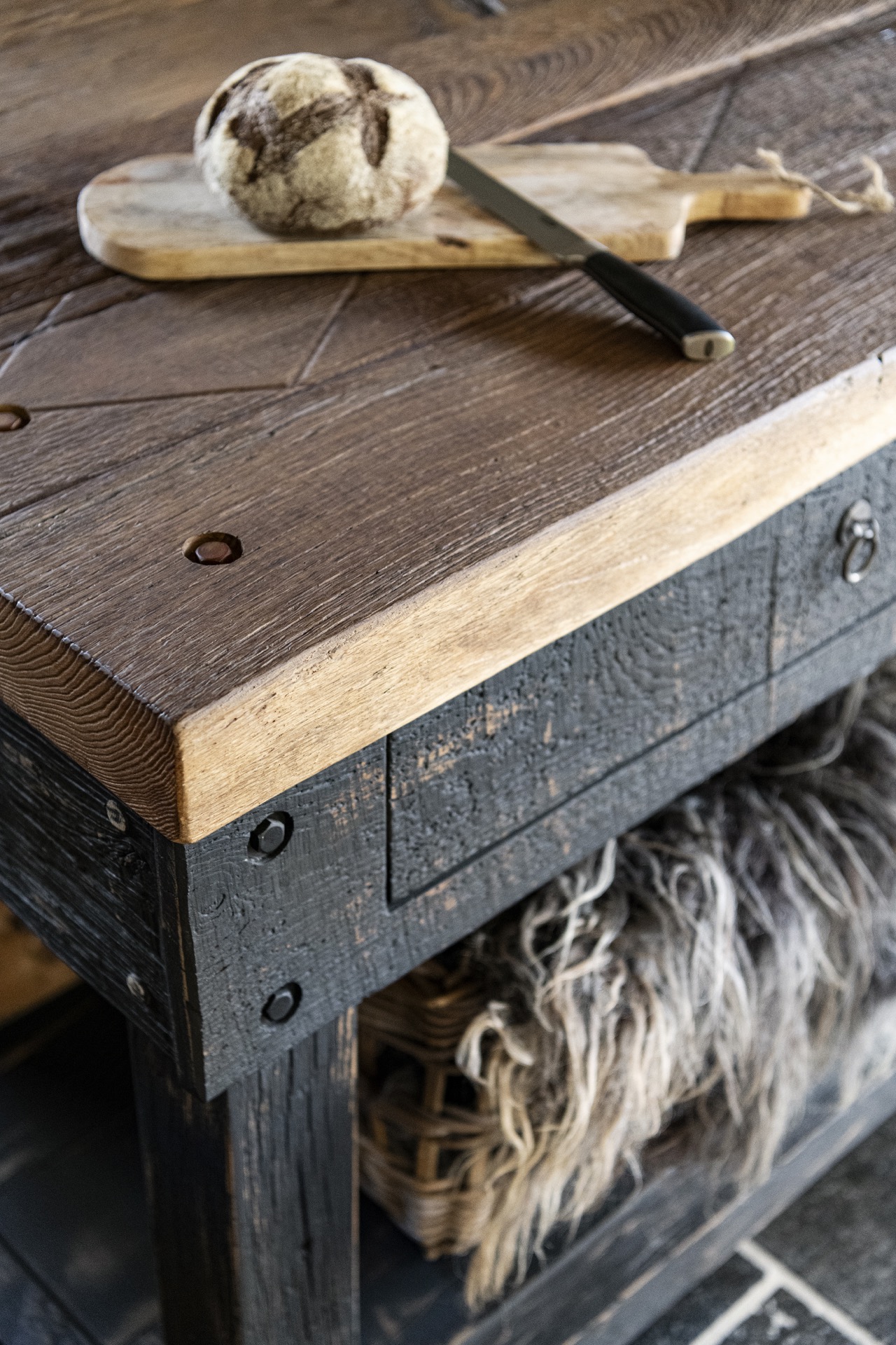 rustic country kitchen: close-up of wooden countertop edge and dark island frame in a rustic kitchen, Luxury, Design, Exclusive, Modern, Custom Made, Special, Beautiful