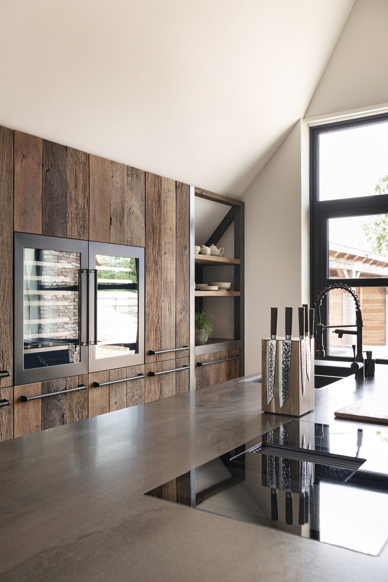 rustic industrial kitchen: detail of wooden kitchen cabinets with glass panels and dark handle rails, Luxury, Design, Exclusive, Modern, Custom Made, Special, Beautiful