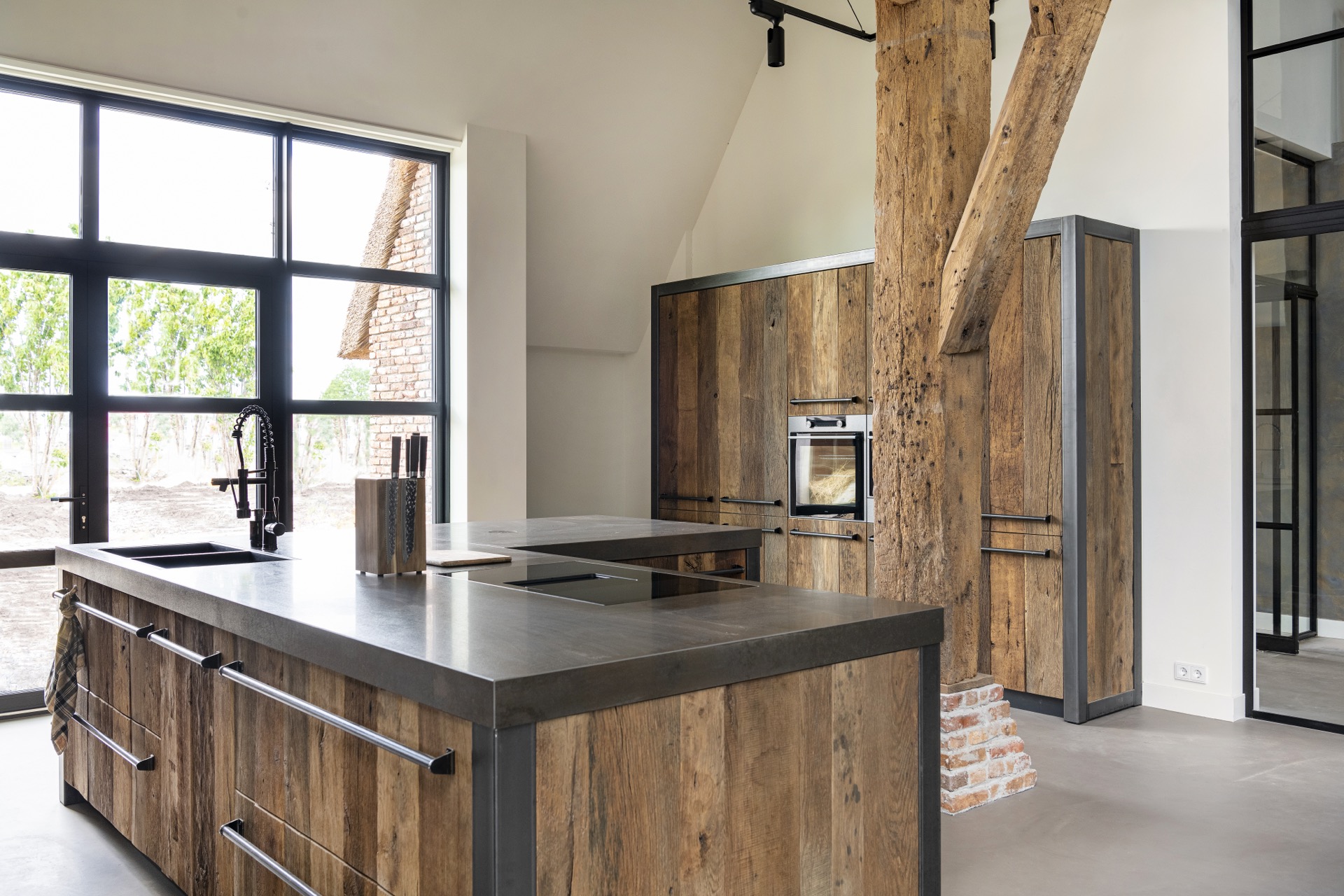 rustic industrial kitchen: kitchen worktop with wood fronts and metal base, large window and view of beam structure, Luxury, Design, Exclusive, Modern, Custom Made, Special, Beautiful